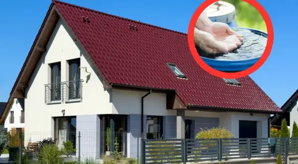 Dom z czerwonym dachem i okręgiem z rękami zbierającymi deszczówkę.